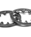 Two 5/16-inch internal-tooth lockwashers, close-up view, medium-carbon steel with black oxide finish.