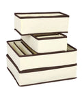 Four Piece Plastic Drawer Organizers With Six Seven Eight Compartments In Warm Beige, stacked for closet sorting and office cleanup.