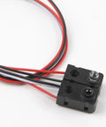 Close-up of Five Pack Infrared Break Beam Sensor Module For Arduino And Robotics, with black plastic casing and wires, 3 to 5V DC output.