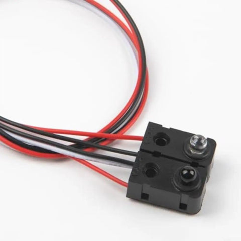 Close-up of Five Pack Infrared Break Beam Sensor Module For Arduino And Robotics, with black plastic casing and wires, 3 to 5V DC output.