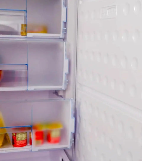 Interior view of Straight Up Spacious 11 Cubic Foot Upright Freezer With Built In Drawer Organizer, showing adjustable shelves.