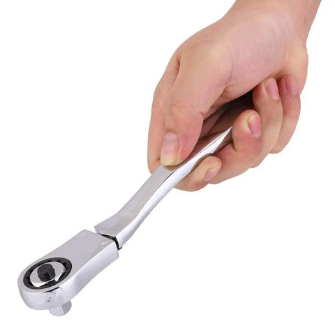 Person holding the Premium Chrome Multitool Ratchet Wrench with Ergonomic Handle, showcasing its shiny chrome finish.