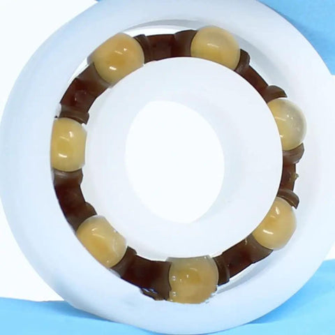 Premium Pom Plastic Ball Bearings 5 Piece Kit showing bearing alignment with smooth rotating balls for precision work.