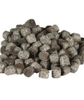 One Hundred Count Of Quarter Inch Composite Decking Plugs In Foggy Wharf Tone, a pile of dark gray plugs for outdoor decking.