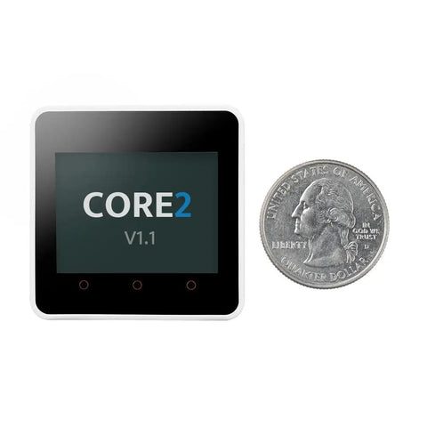 Core2 ESP32 IoT Development Kit V1.1 with dual core processor and 2.0 inch capacitive touch screen next to a coin for size comparison.