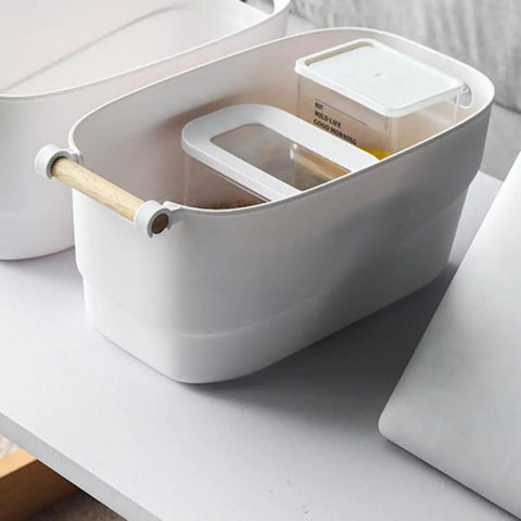 Top Shelf White Plastic Storage Basket With Lidless Opening For Zero Fuss Organization And Straight Up Space Saving Efficiency Ideal For Cozy Living Room Or Bedroom Vibes containing small storage container.