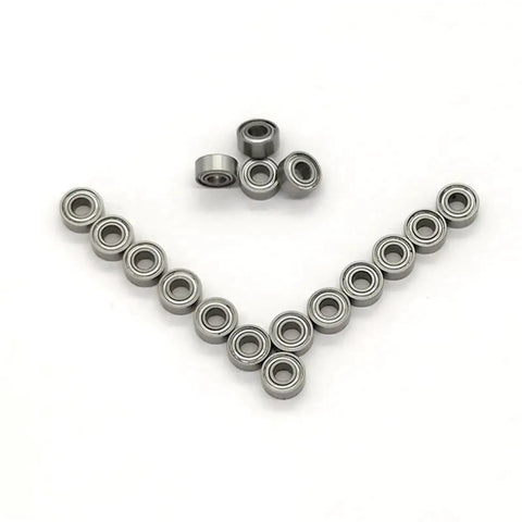 Pro Spec Stainless Steel S683ZZ Deep Groove Ball Bearings 3X7X3 mm arranged in a row, ideal for industrial gear applications.