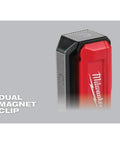 Close-up of red and black Rechargeable Magnetic Flood Light With Dual Clip USB Fast Charge 445 Lumens TRUEVIEW Output.