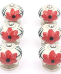 Hand Painted Ceramic Cabinet Knobs Set Of Six Features Dope Red Flower Motif For Dressers And Drawers showing smooth ceramic finish and red floral design.