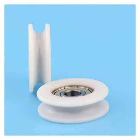 100 Pack Slick Nylon Pulleys With Plastic Coated Bearings For Straight Up Smooth Sliding Door Tracks Cabinet Drawer Glides And Glass Panels No Sweat Quick Swap Upgrade Guaranteed Today, showing a white nylon pulley.
