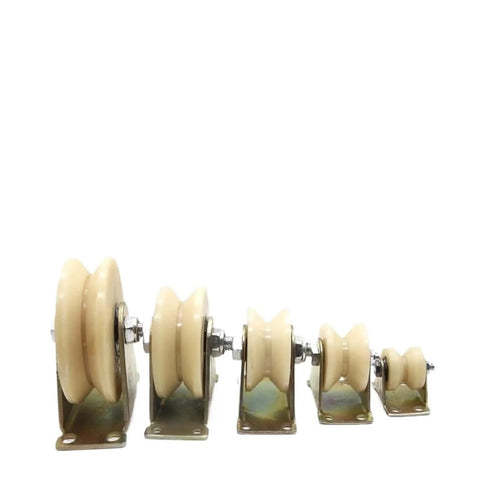Heavy Duty Nylon Sliding Door Pulley Track Wheel Built Like A Tank With Smooth As Butter Gliding And Zero Drama Installation For Closet And Drawer Repair. Five pulley wheels of varying sizes on a white background.