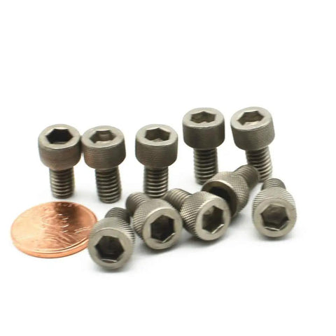 Badass Grade 2 Beefy Titanium M6 Hex Head Bolts 75Mm Long Din912 Standard for Dirt Bike with a penny for scale.