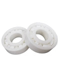 Premium Zirconia Ceramic Bearings For Ridiculously Smooth Rolling And Zero Rust Headaches With Heavy Duty Construction That Totally Slays Steel Components In Every Motor Assembly 60 By 110 By 22 Millimeter Pack Of Five Pieces, showing two zirconia ceramic ball bearings.