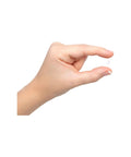 Hand holding a small white ceramic ball, part of Top Shelf Twenty Five Pack G Five Precision Ceramic Bearing Balls Fifteen Sixty Fourth Inch Zirconium Oxide Rock Solid Heavy Duty Smooth Operator Industrial Replacement Parts.