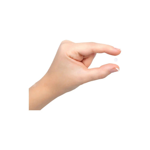 Hand holding a small white ceramic ball, part of Top Shelf Twenty Five Pack G Five Precision Ceramic Bearing Balls Fifteen Sixty Fourth Inch Zirconium Oxide Rock Solid Heavy Duty Smooth Operator Industrial Replacement Parts.