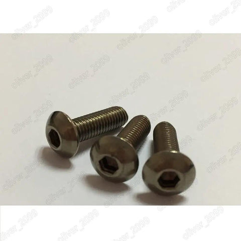 Ridiculously Strong Gr2 Titanium Button Head Screws With Hex Socket Drive M4 0.7 X 50 Millimeter PLack Of 50 screws on a surface.