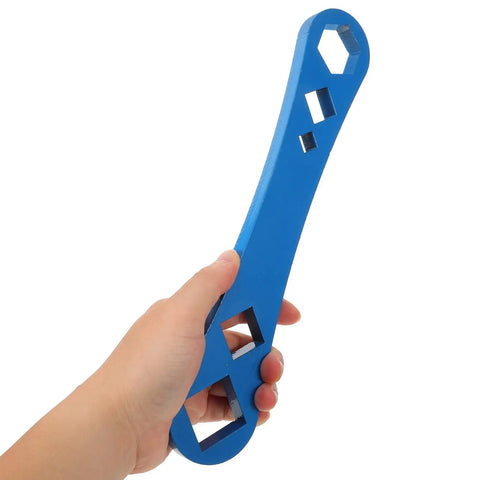 Heavy Duty Oil Drain Screw Removal Tool And 30mm Hexagonal Socket Wrench For Cars held in hand for easy oil filter changes.