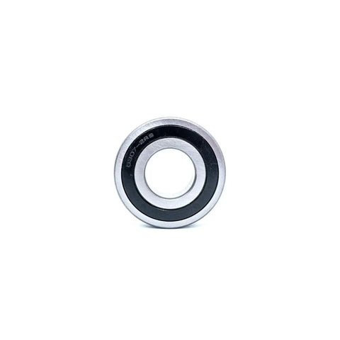 Heavy Duty Front Load Washing Machine Tub Bearing And Seal Kit No Sweat Installation Replacement Compatible With Electrolux And Kenmore Appliances close-up of steel bearing with rubber seal