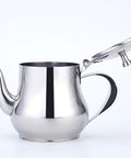Mini 360Ml Stainless Steel Teapot For Tea And More, Ultra Compact Yet Sturdy Kitchen Pot For Coffee Olive Oil And Everyday Use, Easy Pour Design, Sleek Modern Look, Tiny But Mighty with open lid.