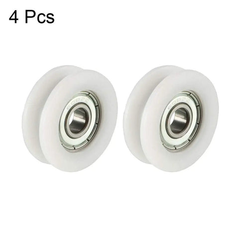 Four Pack Deep Groove V Belt Guide Pulley Wheel With Silent Precision Bearings And Heavy Duty Linear Motion Design For Buttery Smooth Operation And Knockout Durability, white nylon, precision bearings, two pulleys shown.