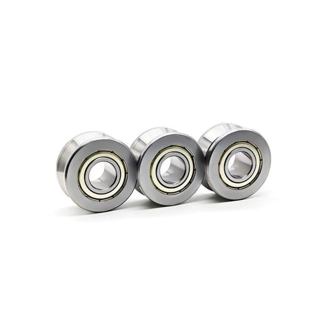 Three Two Piece V Groove Linear Bearing Replacement With Precision Steel Rollers for Frictionless Shaft Guidance and Steady Rotation.