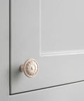 Heavy Duty Zinc Alloy Cabinet Knobs And Pulls Feel Dang Solid Antique Cream Copper Finish on grey cabinet door.