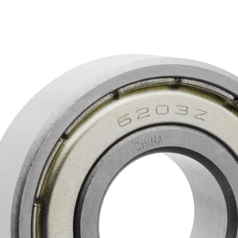 Close-up of 6203Z stainless steel deep groove ball bearing 17mm Id by 40mm Od by 12mm W, part of 100 Pack Stainless Steel Deep Groove Ball Bearings 17mm Id by 40mm Od by 12mm W Double Shielded Top Shelf Workhorse for Auto Rig and Power Tools Heavy Duty Performance.