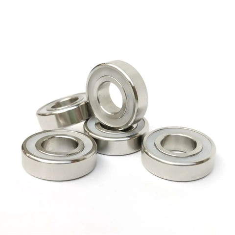 Boss Level 10 Pack S6006 RS Deep Groove Ball Bearings Built From Tough 316L Stainless Steel With Hella Waterproof Dual Seals For Zero Corrosion And Slick 30X55X13 Millimeter Smooth Riding Action, showing multiple deep groove ball bearings.