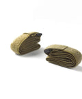 Heavy Duty Polyester Luggage Straps Four Pack For Camping And Travel Rock Solid Outdoor Bundling Belts rolled up on a white background.