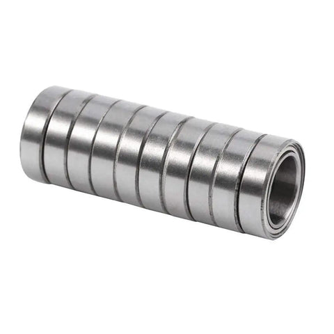 Super Prime Double Shielded Mini Ball Bearings For Tight Squeeze Equipment stacked in a compact row, measuring 10x15x4mm.