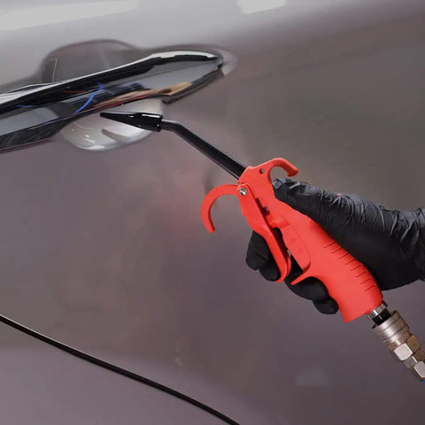 Using Beast Power 100mm Air Blow Gun with detail nozzle for car cleaning, featuring anti-slip rubber coated metal handle.