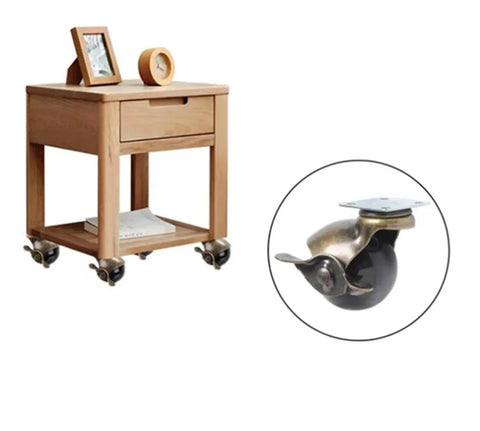 Slick Heavy Duty 2 Inch Swivel Ball Casters In Antique Copper And Brass Finishes For Vintage Furniture And Office Chairs, displayed on a wooden table.