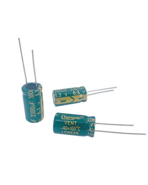Built Tough Aluminum Electrolytic Capacitors 3300uf 6.3v 10x20mm 20 Pack High Performance Electronic Components For Audio Systems Desktop Builds And Hassle Free Circuit Repairs, three electrolytic caps with leads.
