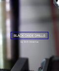 Heavy Duty High Speed Steel Aircraft Extension Drill Bit Five Sixteenth Inch By Six Inch Black Oxide Coated For Lubricity And Coolant Pockets Near The Cutting Edge Built To Last For General Metal Drilling Pack Of 12 DWDA C Series shown in drill press close-up