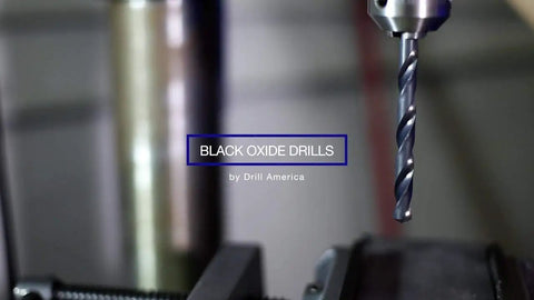 Heavy Duty High Speed Steel Aircraft Extension Drill Bit Five Sixteenth Inch By Six Inch Black Oxide Coated For Lubricity And Coolant Pockets Near The Cutting Edge Built To Last For General Metal Drilling Pack Of 12 DWDA C Series shown in drill press close-up