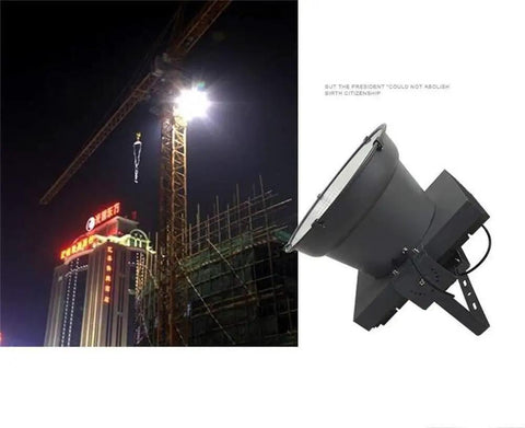 Heavy Duty Rechargeable LED Floodlight shown in use on a construction site, highlighting its bright output and robust design.