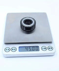 Battle Tested Pro Grade 6202ZZ High Temperature Sealed Ball Bearing 15X35X11MM TB6202ZZ on a scale showing 45 grams.