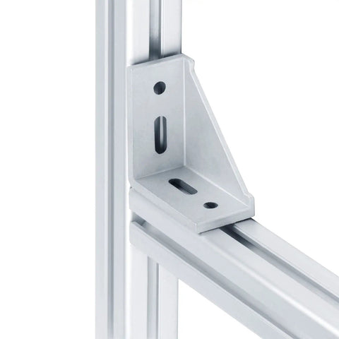 Close-up of a 90-degree aluminum corner bracket attached to a 4040 t slot frame with pre-drilled M8 holes.