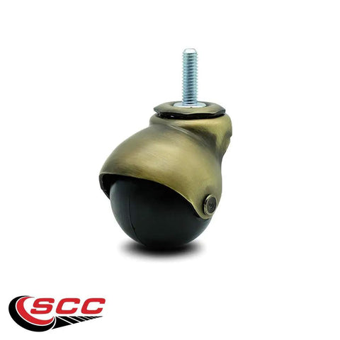 Rock Solid 2 Inch Swivel Ball Caster Wheels For Smooth Furniture Gliding With Killer Antique Brass Hood Finish And 5/16 Threaded Stem That Handles 300 Lbs Easy Set Of 4, featuring black wheel and brass hood.