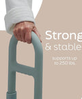 Heavy Duty Clamp On Bathtub Grab Bar Featuring Snap Fit Solid Steel Mounting Design Built To Lock Onto Standard Tub Edges Measuring 2.75 To 6.25 Inches For Reliable Everyday Bathroom Safety, showing a stable handle with a hand gripping.