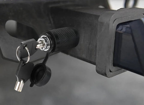 Five Eighth Inch Trailer Hitch Lock With Extra Long Four And A Half Inch Span For Three Inch Receivers Plus Two And A Half Inch And Two Inch Adapters Anti Rattle O Rings Locking Hitch Pin To Keep Your Trailer Truck Or Car Safe, installed view showing keys and lock mechanism on a receiver hitch.