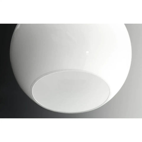 Close-up of glass globe from Carisa Collection 7 3/8 Inch One Light Flush Mount For Hallways And Bathrooms With Cool Vintage Retro Vibe.