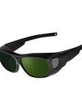 Wrap-Around Welding Glasses Offer Straight-Up UV Shield Blocking 99.9 Percent Rays, rugged black goggles with green lenses.