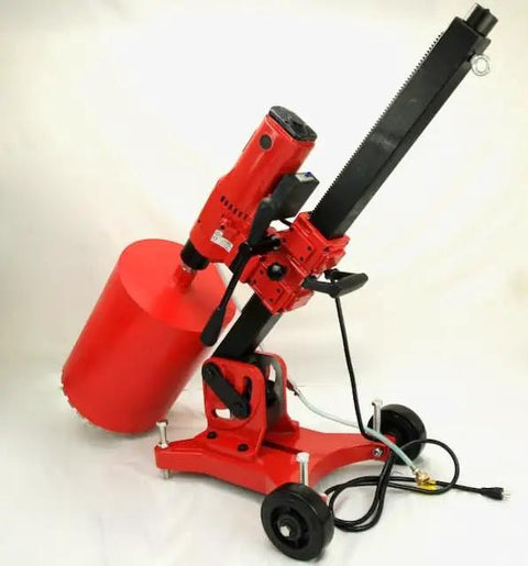 Badass 12 Inch Concrete Core Drill Rig With 12 Piece Pro Series Diamond Wet Core Bit Set 1 To 12 Inches on a rolling base.