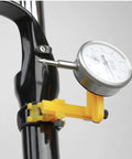 Dial gauge on Beast Pro Grade Bike Wheel Truing Stand With Precision Percentage Table, Easy Rim Alignment And Spoke Adjustment Tool