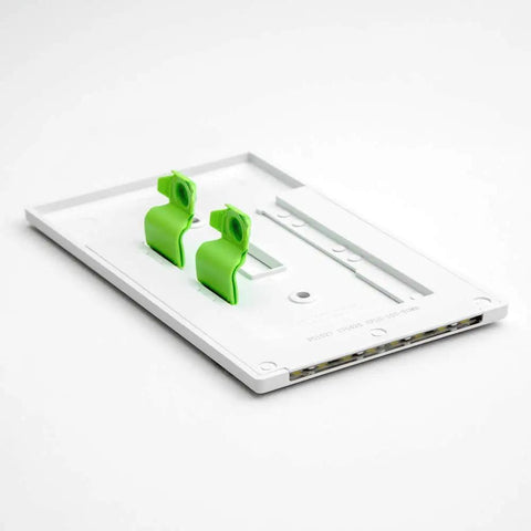 3 Pack SwitchLight LED Night Light For Single Pole Switches with green clips on white plate, auto on off sensor