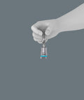 Hand holding a TORX bit from Belt B 3 TORX Bit Socket Set With Holding Function For Screws And Bolts, 3/8 Inch Drive, 9-Piece.