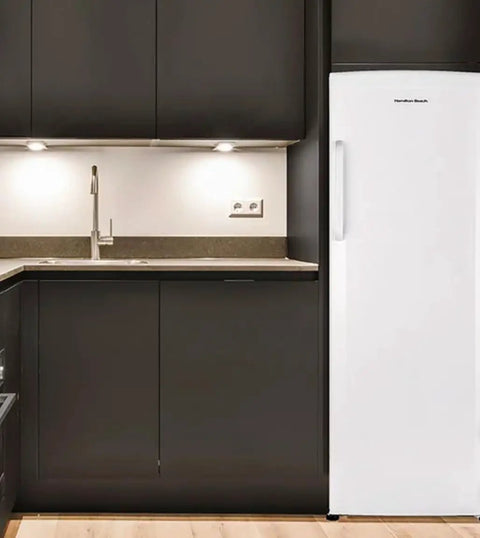 Straight Up Spacious 11 Cubic Foot Upright Freezer With Built In Drawer Organizer And Easy Manual Defrost in modern kitchen setting