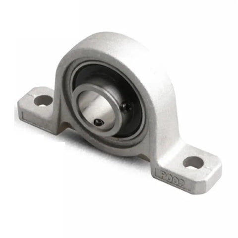 Rock Solid Heavy Duty Zinc Alloy Pillow Block Mounted Ball Bearing Self Aligning Industrial Support Block With Corrosion Resistant Precision Housing designed for smooth shaft alignment, shown from side angle.