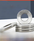 M4 304 Stainless Steel Disc Spring Washers 100 Pack Beast Mode Rust Resistant Springs stacked on a white surface.
